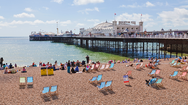 A landscape of Brighton beach and the iconic Brighton Pier